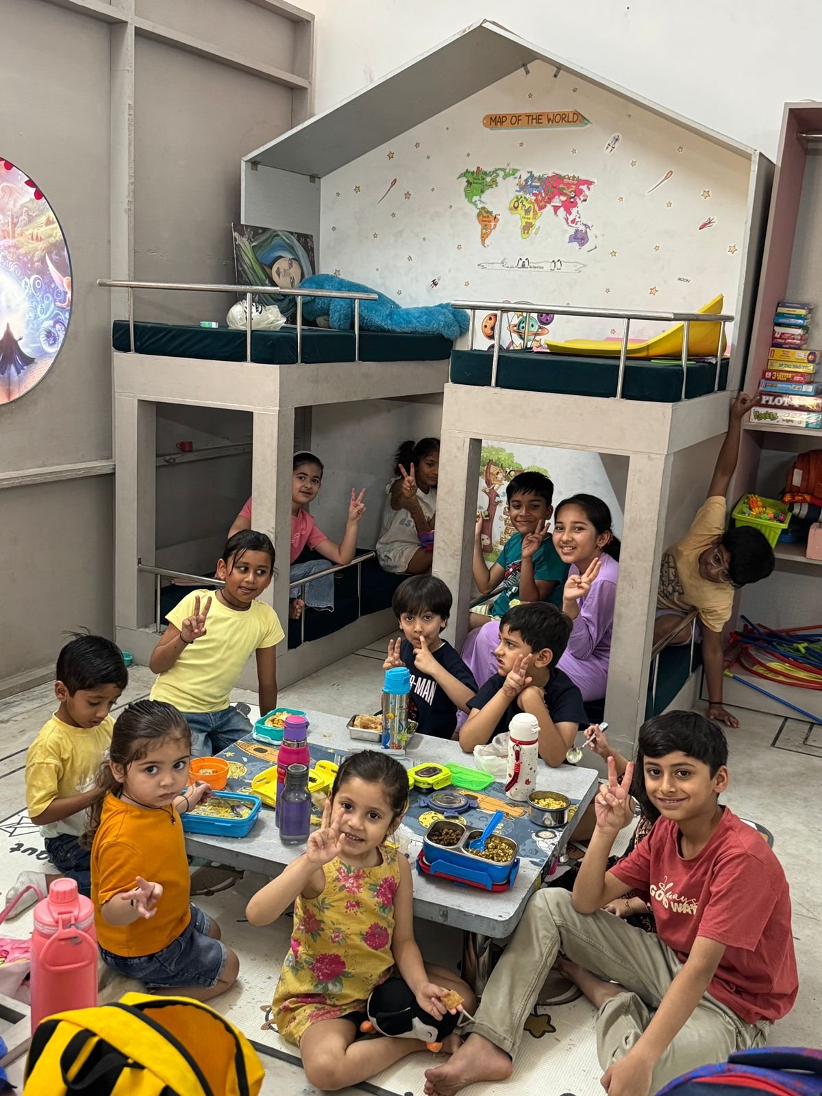 Children enjoying snack time together at Celestial Kids
